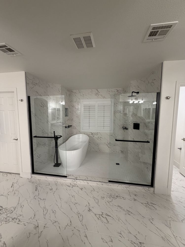 Parallel Lux spa bathroom with freestanding tub and glass shower